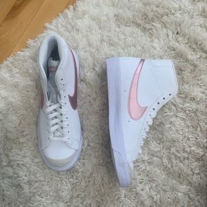 White Nike blazers with rose gold swoosh